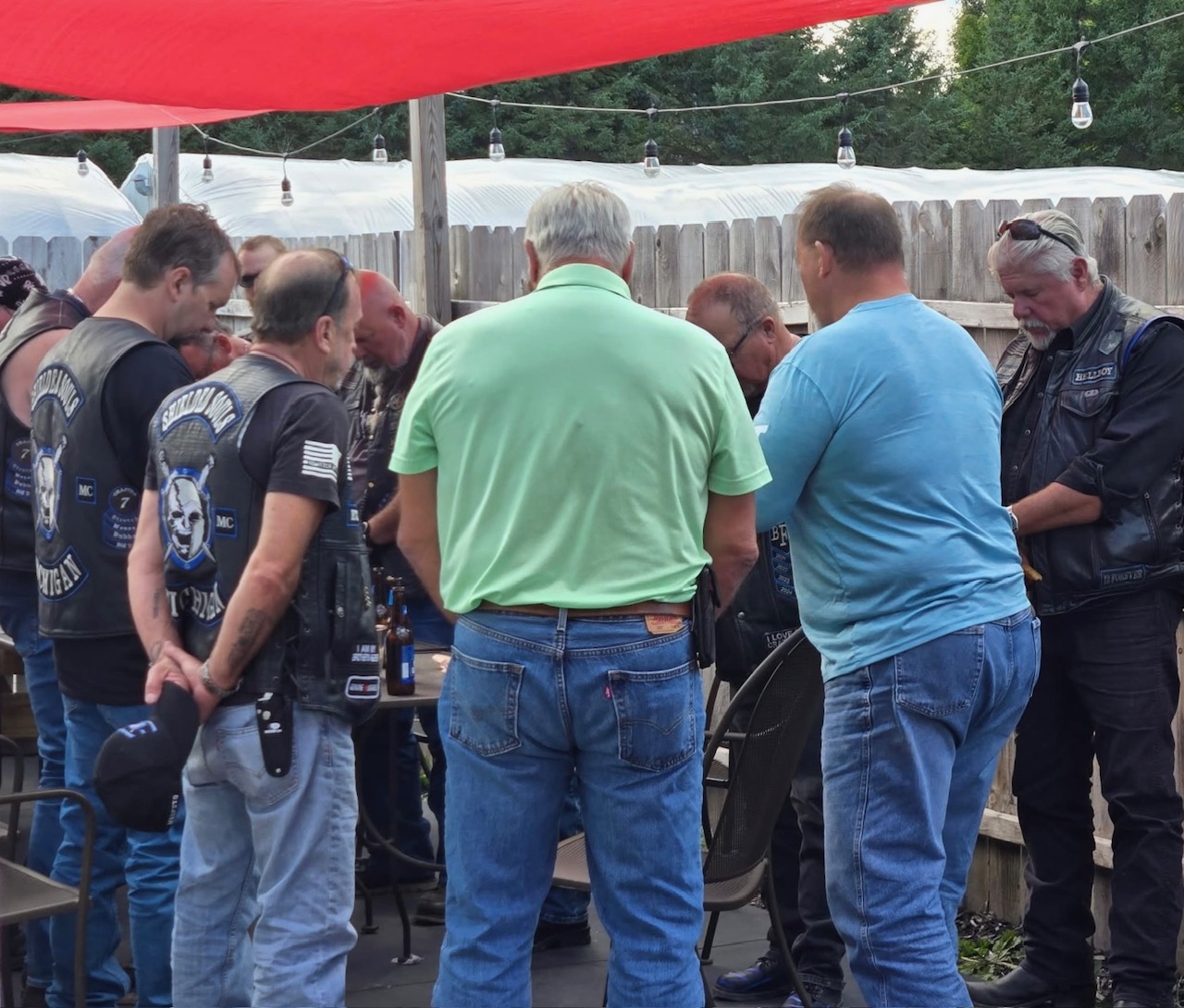 Church members gathered for a bike blessing event.
